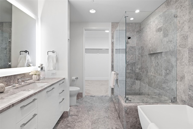 7901 Windrose Ave Unit 1403, Plano, TX 75024 - full bathroom with a shower stall, vanity, a walk in closet, a freestanding tub, and recessed lighting