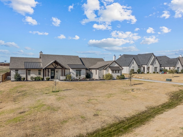 view of front of house with a front lawn