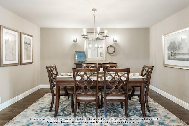 dining room with dark hardwood / wood-style flooring and a chandelier