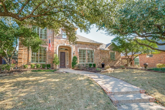 view of front of house with a front lawn