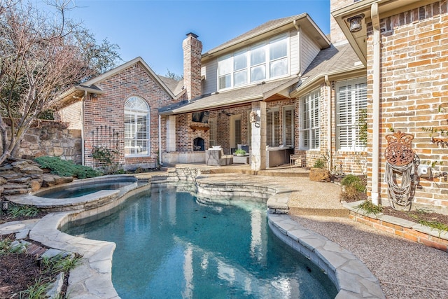 view of swimming pool featuring an in ground hot tub, a patio area, and ceiling fan