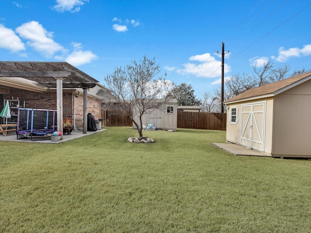 view of yard featuring a pergola and a storage unit