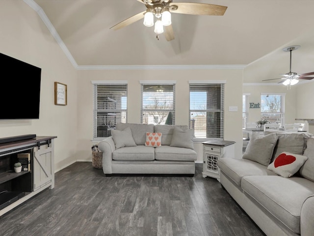 living room with dark wood-type flooring, lofted ceiling, ornamental molding, and ceiling fan