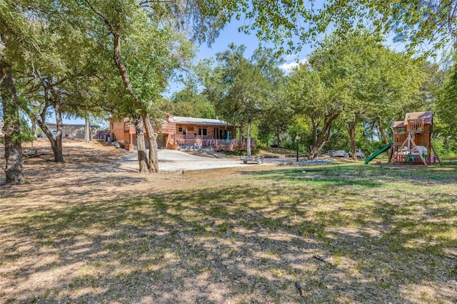 view of yard with a playground