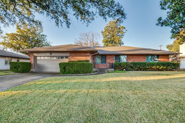 ranch-style house with a front lawn and a garage