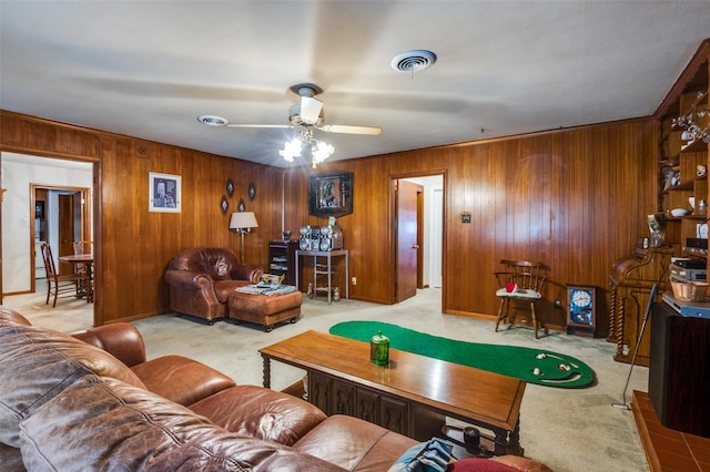 living room featuring ceiling fan and light colored carpet