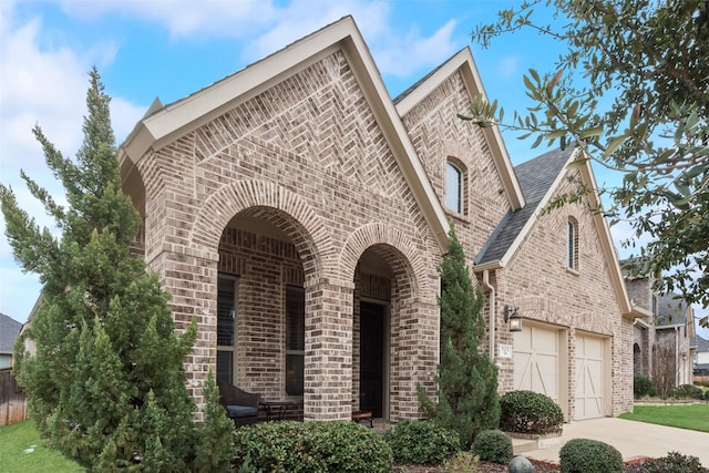 view of front of property with a garage