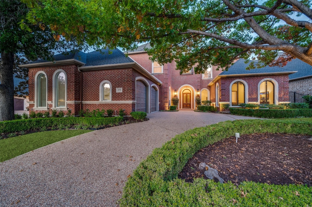 view of front of property with a garage