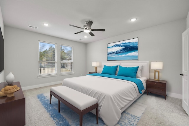 carpeted bedroom with ceiling fan