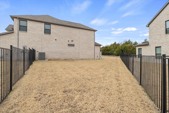 view of side of property with central AC