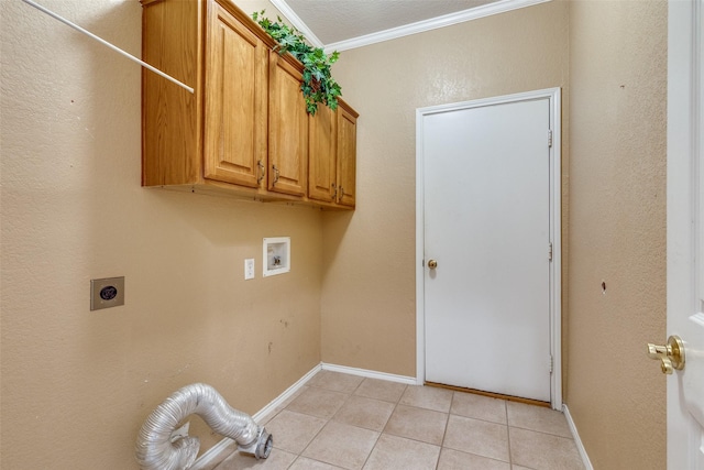 clothes washing area with light tile patterned floors, cabinet space, ornamental molding, hookup for an electric dryer, and washer hookup