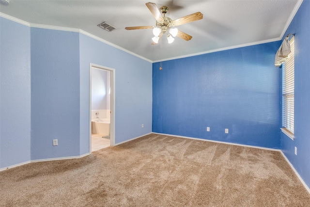 interior space featuring ornamental molding, visible vents, and a ceiling fan