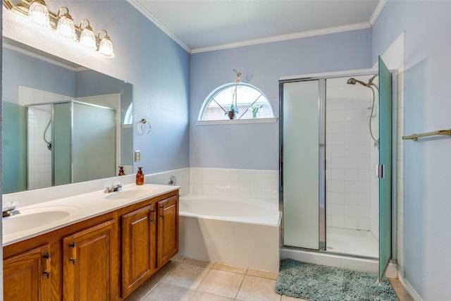 bathroom with crown molding, a sink, and tile patterned floors