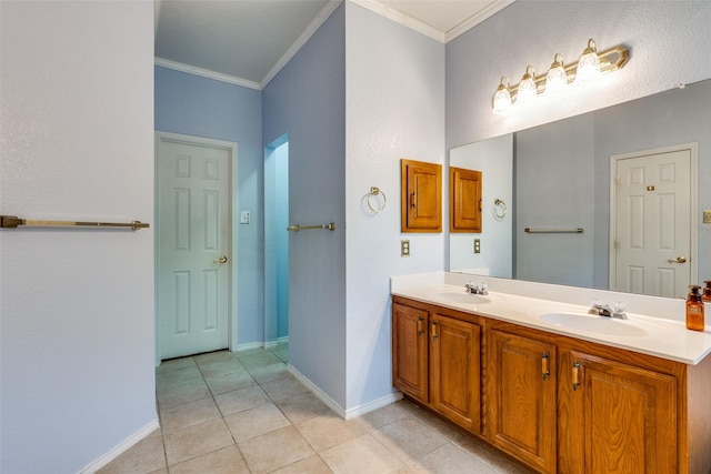 full bath featuring ornamental molding, tile patterned flooring, and a sink