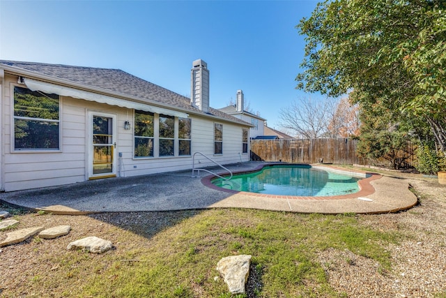 view of swimming pool with a patio, a fenced backyard, and a fenced in pool