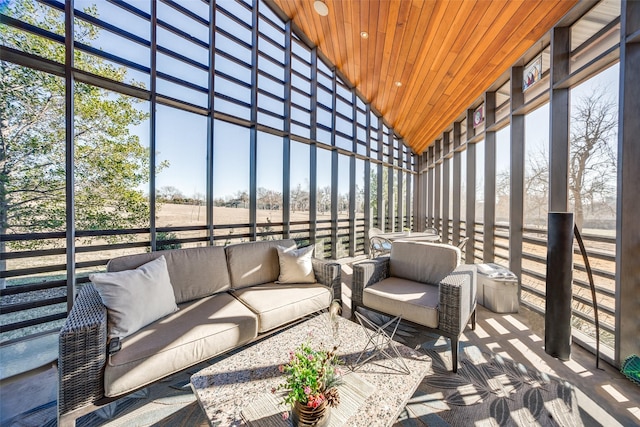 unfurnished sunroom with a wealth of natural light and wooden ceiling