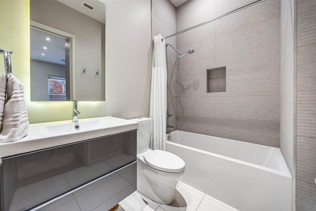 full bathroom featuring vanity, toilet, shower / tub combo with curtain, and tile patterned flooring