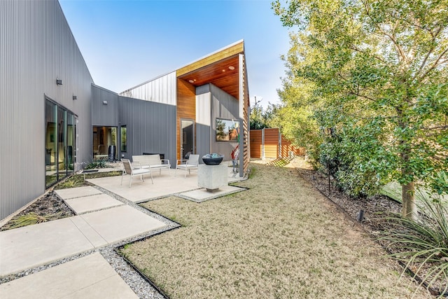 view of yard with a patio area