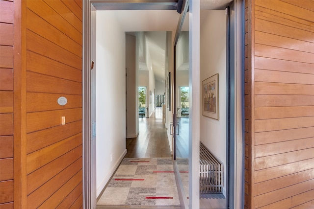 hallway with wooden walls