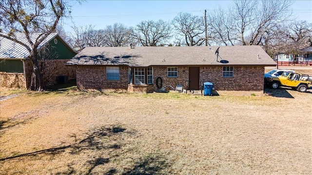 back of property with central AC unit