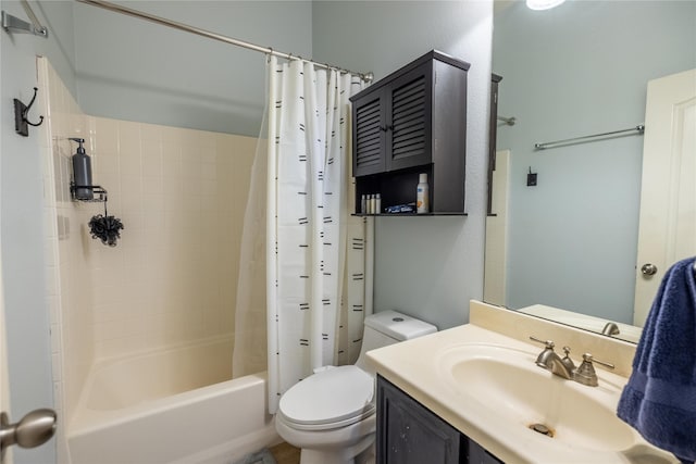 full bathroom with toilet, shower / tub combo, and vanity