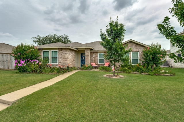 ranch-style home with a front yard