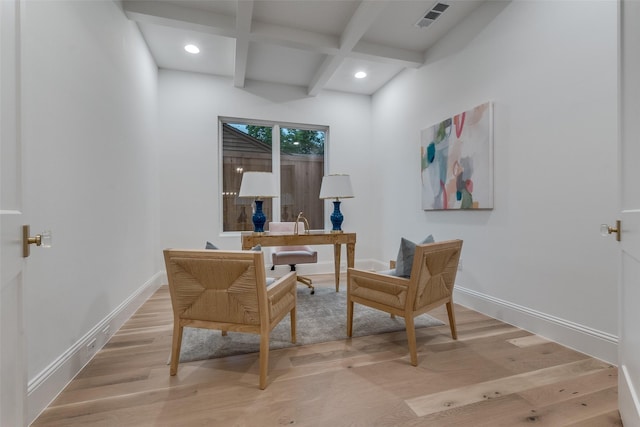 office space featuring wood-type flooring, beamed ceiling, and coffered ceiling