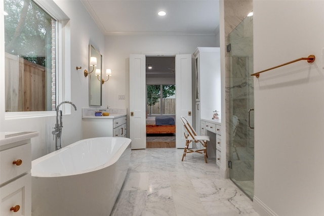 bathroom with ornamental molding, shower with separate bathtub, and vanity