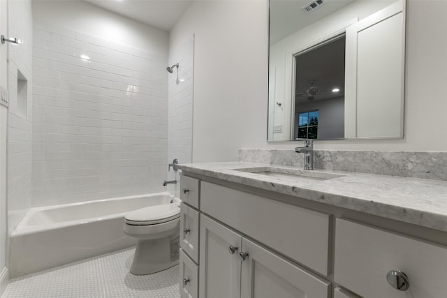 full bathroom with vanity, toilet, tile patterned flooring, and shower / washtub combination