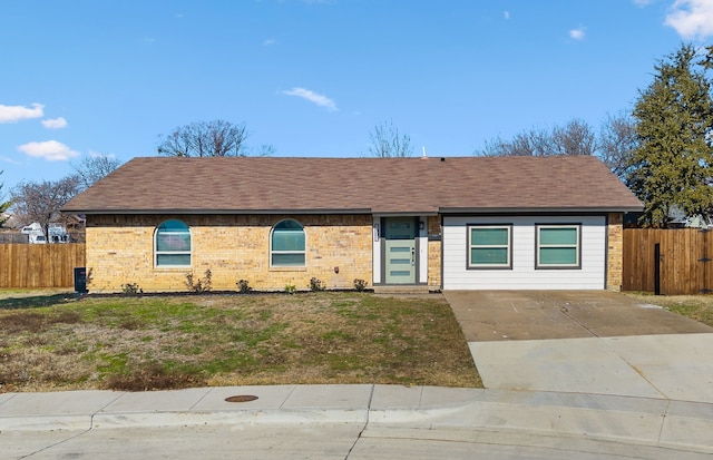 ranch-style house with a front yard