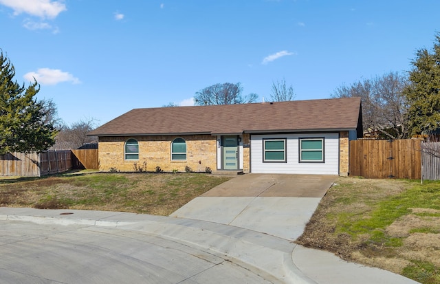 ranch-style house with a front lawn