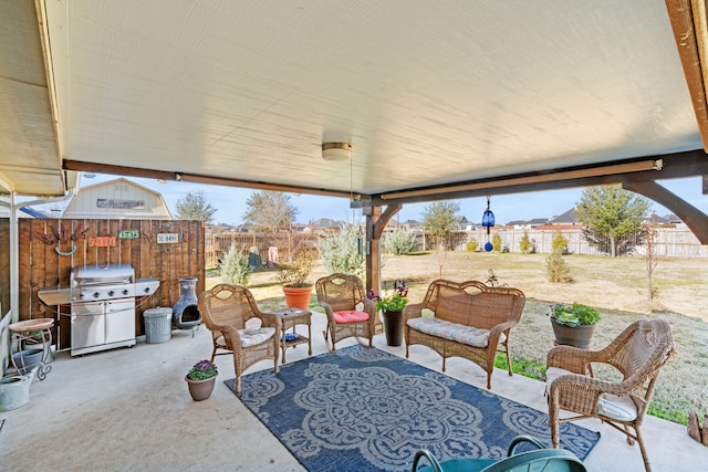 view of patio with a grill and outdoor lounge area