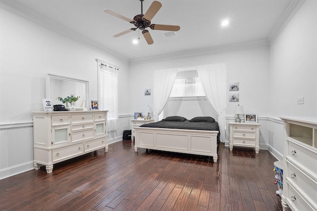 bedroom featuring ceiling fan, dark hardwood / wood-style flooring, and ornamental molding