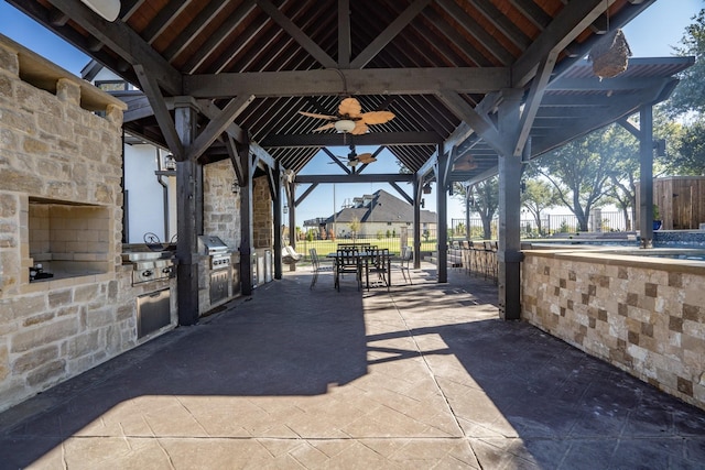 110 Quiet Hill Cir, Copper Canyon, TX 76226 - view of patio with an outdoor kitchen, a ceiling fan, a gazebo, outdoor dining space, and fence