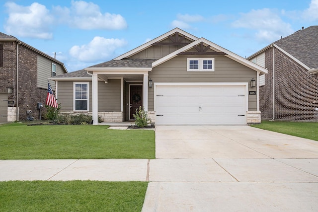 craftsman-style house with a front yard and a garage