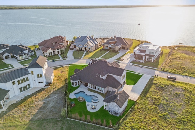 aerial view featuring a water view