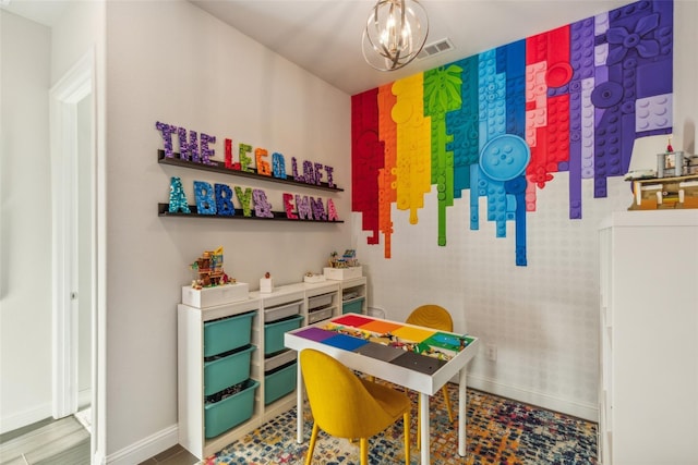 office area with an inviting chandelier