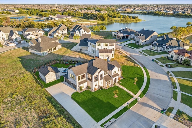 bird's eye view with a water view