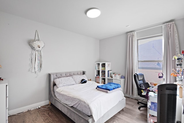 bedroom featuring hardwood / wood-style floors