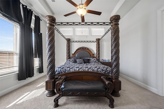 bedroom featuring ceiling fan and light colored carpet