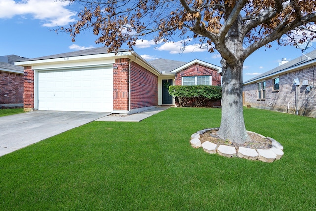 ranch-style house featuring a front lawn and a garage