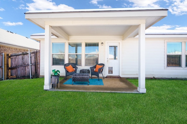 back of house with a patio area, outdoor lounge area, and a yard