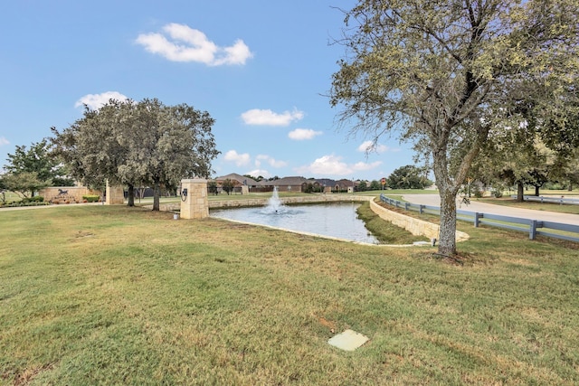 view of yard featuring a water view