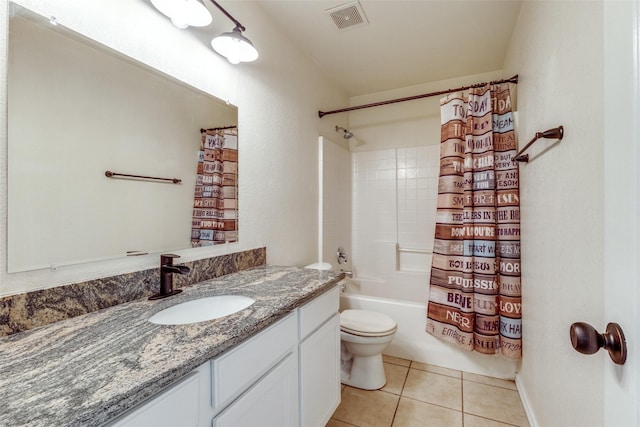 full bathroom with toilet, tile patterned floors, vanity, and shower / bath combo with shower curtain