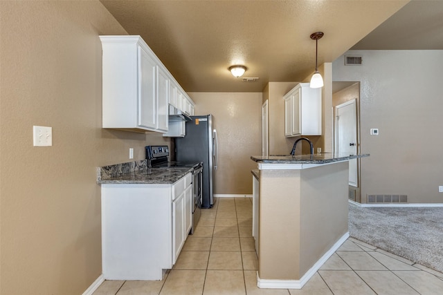 kitchen featuring white cabinets, kitchen peninsula, electric range, and pendant lighting