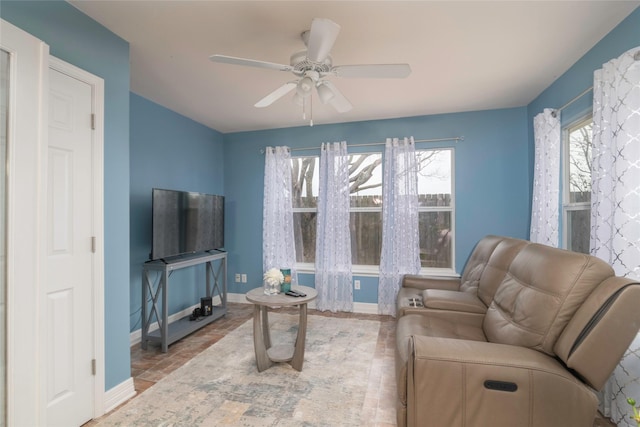 living room with ceiling fan