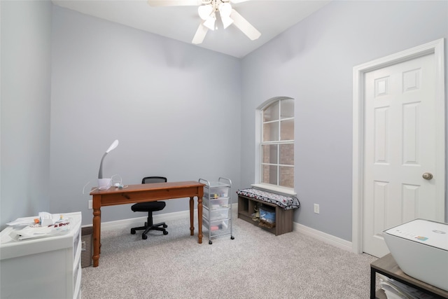 carpeted office with ceiling fan