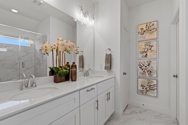 bathroom with walk in shower and vanity