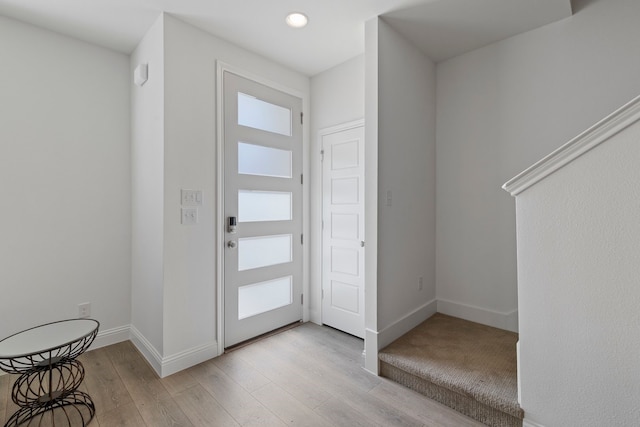 entrance foyer featuring light hardwood / wood-style floors