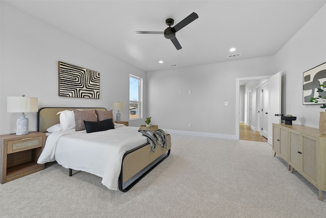 carpeted bedroom with ceiling fan